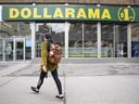 A person walks past a Dollarama Inc. store in Montreal.