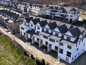 FILE - Townhouses under construction are shown in Cranberry Township, Pa., on March 29, 2024. On Thursday, May 16, 2024, Freddie Mac reports on this week's average U.S. mortgage rates.