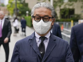 FILE - Bill Hwang, founder of Archegos Capital Management, leaves the courthouse in New York, Wednesday, June 1, 2022. Hwang, the founder of Archegos Capital Management, and his former CFO Patrick Halligan, went on trial Monday, May 13, 2024, accused of manipulating markets through secret trades in derivatives that cost corporations, banks and brokerages billions of dollars when the hedge fund collapsed.