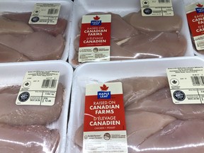 Packages of Maple Leaf Foods chicken breasts are shown at a grocery store in Oakville, Ont., Friday, Jan.6, 2023. Maple Leaf Foods Inc. reported a profit in its latest quarter compared with a loss a year ago as its sales edged lower.THE CANADIAN PRESS/Richard Buchan