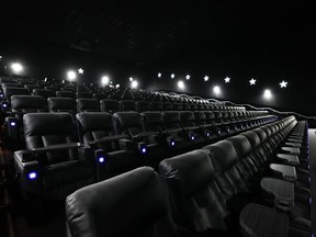 Cineplex Inc. reported a profit in its latest quarter compared with a loss a year ago as its results were boosted by the sale of its arcade game business. Theatre seats are shown at Cineplex Junxion Erin Mills in Mississauga, Ont., on Monday, April 24, 2023.