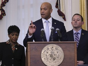 Maryland Gov. Wes Moore speaks at a bill signing ceremony Thursday, May 9, 2024, in Annapolis, Maryland, where he signed two legislative measures aimed at protecting Big Tech's personal data online, including a Maryland bill the second state to introduce strict restrictions on information collected about children.  Maryland House of Representatives Speaker Adrienne Jones stands at left and Maryland Senate President Bill Ferguson stands at right.