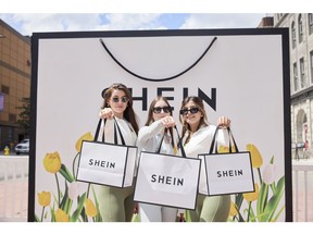 Guests with shopping bags at the SHEIN Move & Groove Pop-Up
