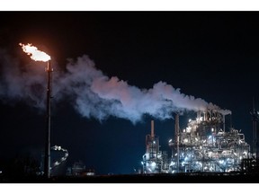 04 February 2024, Oberhausen: Gas is flared at the Ruhrchemie plant at OQ Chemicals in Oberhausen. The product range focuses on oxo-intermediates and oxo-derivatives. Photo: Fabian Strauch/dpa