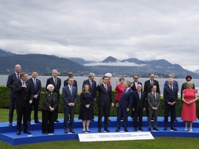 Finance Ministers and Central Bank Governors pose for the family picture at the G7 Finance Ministers meeting in Stresa, northern Italy, Friday, May 24, 2024.