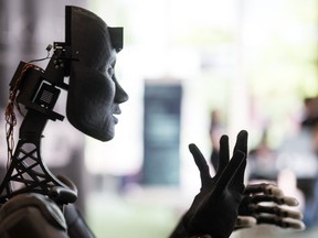 A robot using artificial intelligence is displayed at a stand during the International Telecommunication Union (ITU) AI for Good Global Summit in Geneva, on May 30, 2024.