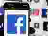 The Facebook logo is seen on a mobile phone on Oct. 14, 2022.