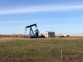 In this file photo taken on October 20, 2019, an oil rig in Stoughton, Sask.