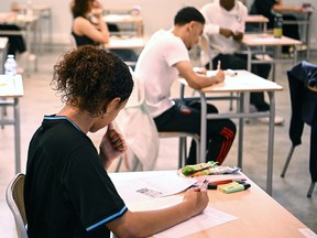 Students prepare for the philosophy test as part of the baccalaureat exams at the Condorcet High School in Bordeaux, south-western France on June 18, 2024.