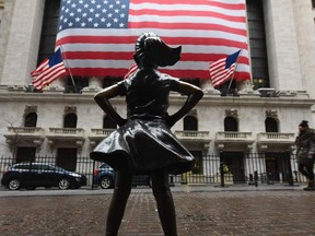 The Fearless Girl statue stands in front of the New York Stock Exchange near Wall Street on March 23, 2020 in New York City.