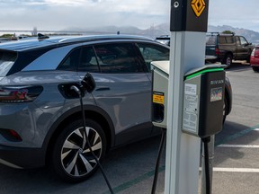 A Volkswagen ID.4 electric vehicle (EV) at a Rivian charging station in San Francisco, Calif. on June 25, 2024.