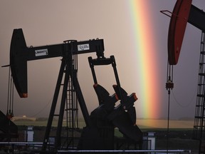 Pumpjacks draw out oil and gas from wells near Calgary on Sept. 18, 2023.