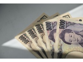 Japanese 10,000 yen and 5000 yen are arranged for a photograph in Tokyo, Japan, on Friday, May 10, 2024. Photographer: Noriko Hayashi/Bloomberg