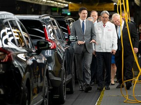 Justin Trudeau and Doug Ford at a Honda plant.