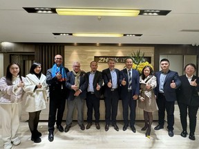 Emmanuel Ladent, CEO, CARBIOS (fifth from right) and Zhu GuoYang, President of Zhink Group (fourth from right) surrounded by their teams at Zhink Group's Headquarters in Hangzhou, China