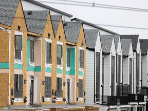 Townhomes under construction are seen along Bow Trail west of downtown Calgary.