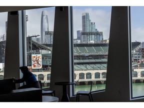 Oracle Park and Salesforce Tower, left, seen from the fifth floor caf at Visa's new headquarters in San Francisco, California, US, on Tuesday, May 28, 2024. Photographer: Philip Pacheco/Bloomberg