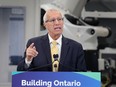 Vic Fedeli, Ontario's minister of economic development and trade, speaking at a press conference in Windsor, Ont., 2023.
