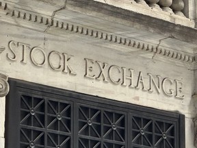 FILE - A sign at the New York Stock Exchange is shown on June 18, 2024 in New York. Global shares are mostly lower on Friday, June 21, 2024, after a retreat on Wall Street, where a drop in Nvidia stock pulled stocks lower.