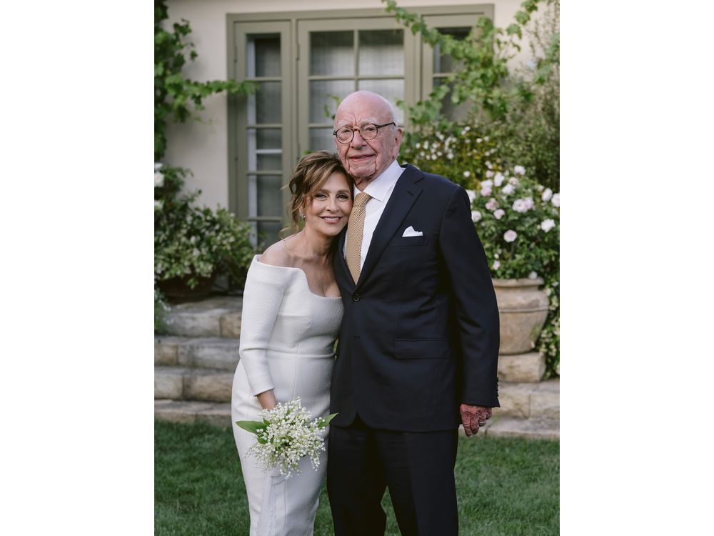 This image provided by News Corp. shows Rupert Murdoch and Elena Zhukova posing for a photo, Saturday, June 1, 2024 during their wedding ceremony at his vineyard estate in Bel Air, Calif. (News Corp. via AP)