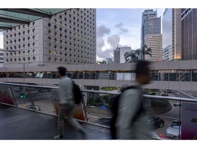 Some investors worry that the government's preoccupation with national security could affect commercial interests. Photographer: Paul Yeung/Bloomberg