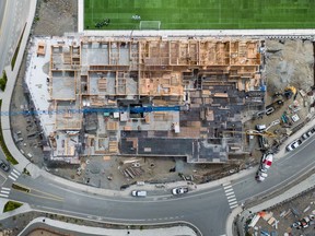 A rental apartment complex is seen under construction at a new housing development in Langford, B.C., on May 30, 2024.