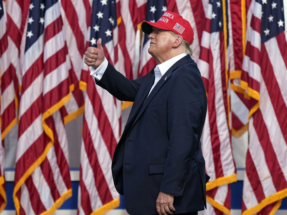 Republican presidential candidate former U.S. President Donald Trump reacts to supporters at a campaign rally in Chesapeake, Va. on June 28, 2024.