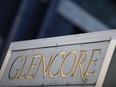Signage stands near the Glencore Plc headquarters office in Baar, Switzerland, on July 6, 2018.