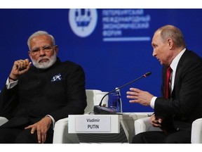 Vladimir Putin, right, and Narendra Modi in St. Petersburg, Russia, in 2017.
