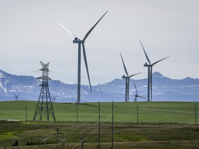 Power transmission lines and wind turbines near Pincher Creek, Alta.