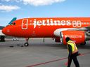 A Canada Jetlines Airbus A320 jet pulls up to the Calgary airport gate on the airline's inaugural flight at Calgary, Alta., Sept. 22, 2022.