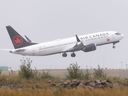 An Air Canada 737 Max 8 jet takes off at Calgary International Airport.