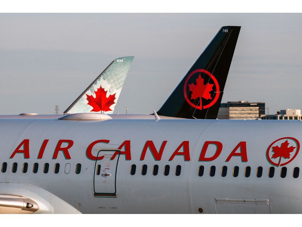 Air Canada planes on the tarmac at Toronto Pearson International Airport.
