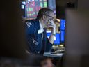Traders working on the floor of the New York Stock Exchange.