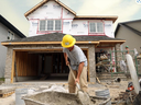 Housing starts in Canadian centres of 10,000 population and over were down seven per cent in 2023, CMHC said.