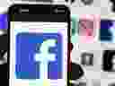 The Facebook logo is seen on a mobile phone, Oct. 14, 2022, in Boston.