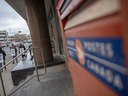 Picketers march down Saskatchewan Drive in Regina in front of the Canada Post offices as the Canadian Union of Postal Workers hit the picket lines nationwide on Friday, Nov. 15, 2024. Seniors in Canada are the group that depends the most on the mail for the delivery of pension cheques.