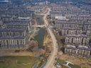 Unfinished buildings at a development on the outskirts of Nanjing, China, in 2021. Local authorities that relied on land sales for revenue have struggled to service their liabilities in recent years as the property crisis wiped out demand for new building.