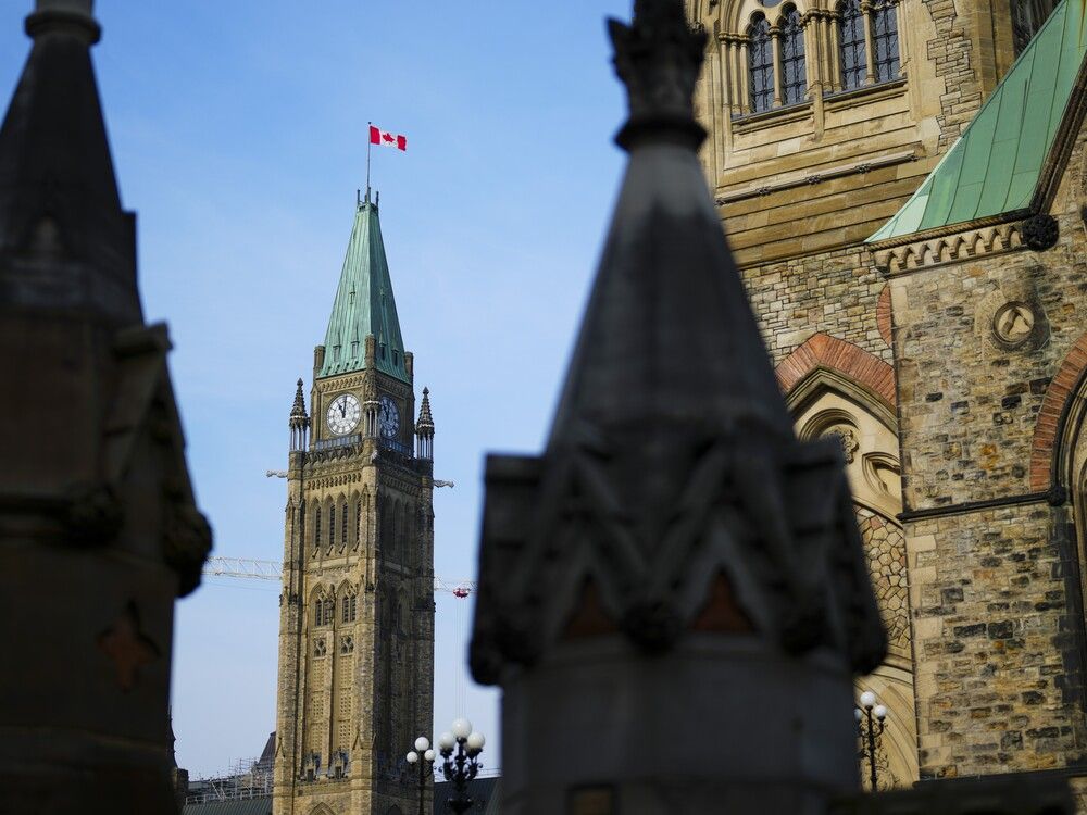 The Canadian flag flies above the Peace Tower on Parliament Hill in Ottawa on Wednesday, October 30, 2024. 