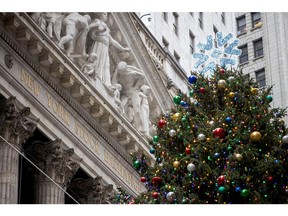 A Christmas tree outside the New York Stock Exchange (NYSE) in New York, US, on Monday, Dec. 9, 2024. Stocks struggled to make headway, following a furious rally that put the market on pace for its best year since 2019, with traders awaiting key inflation data that will help shape the outlook for Federal Reserve rates. Photographer: Michael Nagle/Bloomberg
