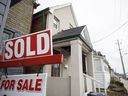 The number of homes sold in Canada in November jumped 26 per cent from a year ago, following a 30 per cent gain in October.