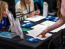 Job seekers attend a job fair in Langford, British Columbia.