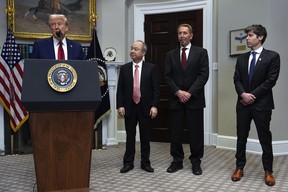 President Donald Trump, from left, speaks as Masayoshi Son, SoftBank Group CEO, Larry Ellison, chairman of Oracle Corporation and chief technology officer, and Sam Altman, OpenAI CEO listen in the Roosevelt Room at the White House, Tuesday, Jan. 21, 2025, in Washington.