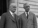Willis C. Hawley (left) and Reed Smoot meeting shortly after the signing of the Smoot-Hawley Tariff Act.