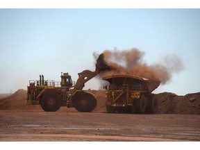 An autonomous conveyance receives ore from a dumper astatine the Fortescue Metals Group Ltd. Cloudbreak excavation successful the Pilbara portion of Western Australia, Australia, connected Tuesday, Oct. 17, 2023. Chinese request for Australian robust ore volition stay beardown contempt the nation's disappointing post-pandemic recovery, according to Fortescue Metals, the world's fourth-biggest producer.