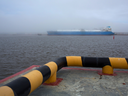 An ice-class tanker used for shipping liquefied natural gas sits in the Sabetta sea port near the Yamal LNG plant operated by Novatek PJSC, in Sabetta, Russia.