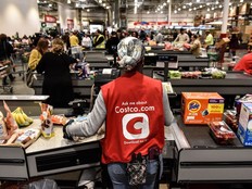 A worker in a check-out line at a Costco store in New Jersey.