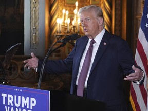 U.S. president-elect Donald Trump speaks during a news conference at Mar-a-Lago in Palm Beach, Fla.