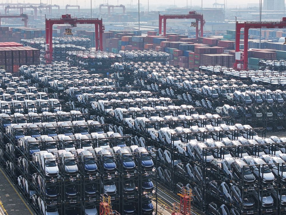 BYD Co. Ltd. electric cars waiting to be loaded onto a ship are stacked at the international container terminal of Taicang Port in Suzhou, in China's eastern Jiangsu province.