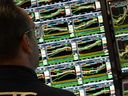 A trader works at his desk on the floor of the New York Stock Exchange (NYSE) during the first session of the new year on January 2, 2025, in New York City. (Photo by TIMOTHY A. CLARY / AFP) (Photo by TIMOTHY A. CLARY/AFP via Getty Images)